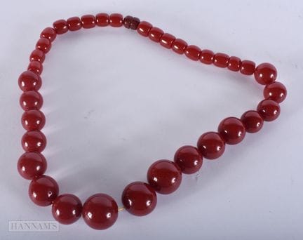 A CHERRY BEAD NECKLACE. 97 grams. 52 cm long, larg