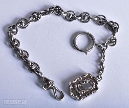 A WHITE METAL ALBERT CHAIN. 32 grams. 29 cm long.