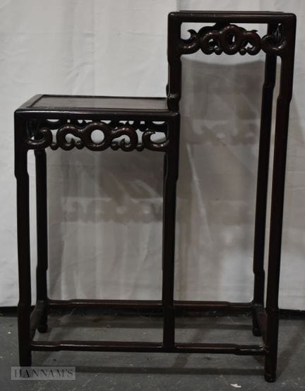 A 19TH CENTURY CHINESE CARVED HUANGHUALI WOOD DOUB