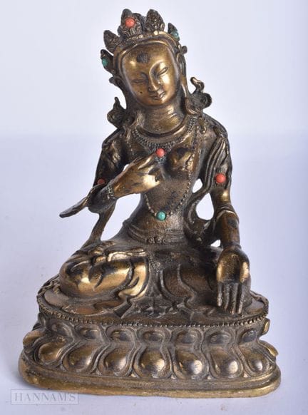 Ein chinesisch-tibetischer Buddha aus Bronze mit E