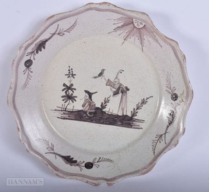 AN 18TH CENTURY FAIENCE DELFT MANGANESE PAINTED CH