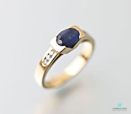 Bague jonc en or jaune 750 millièmes sertie d'un s