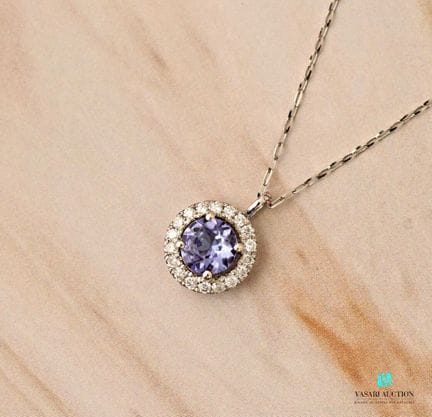 Chaîne et son pendentif de forme ronde serti d'une