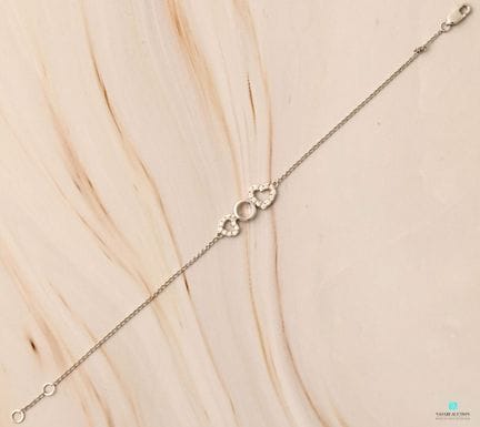 Bracelet en or blanc 750 millièmes orné de deux mo