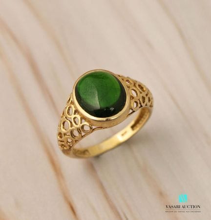 Bague en argent doré 925 millième ornée d'une tour