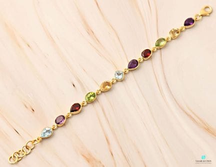 Bracelet en argent doré 925 millièmes ornés de pie