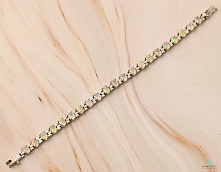 Bracelet en argent 925 millièmes serti d'opales ca