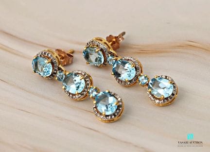 Paire de boucles d'oreilles en argent doré 925 mil