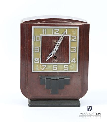 Orologio da tavolo con base in bachelite marrone; 