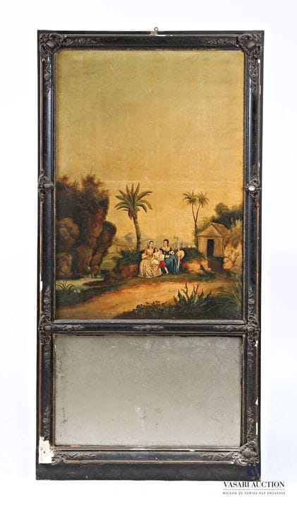 A trumeau made of blackened wood and molded stucco