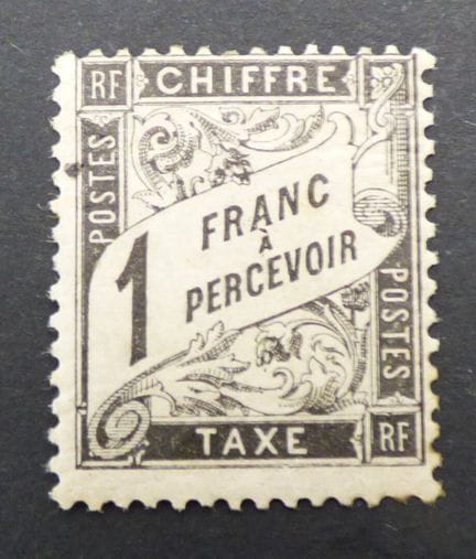 Francia: TX 22, 1F nero, francobollo raro, X, quot