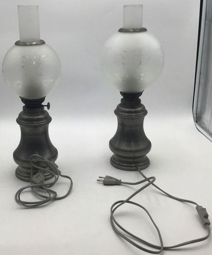 Two electrified pewter kerosene lamps with frosted