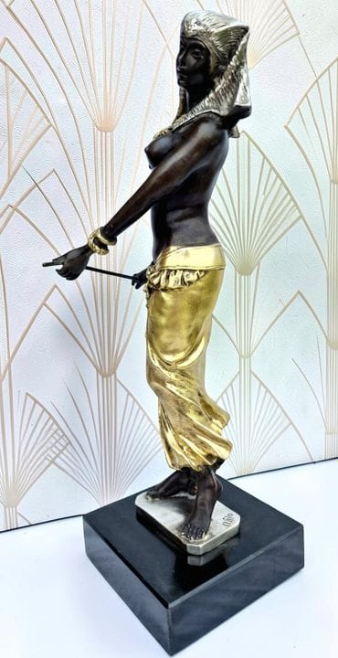 Bronze doré à l'Or fin et à patine argentée représ