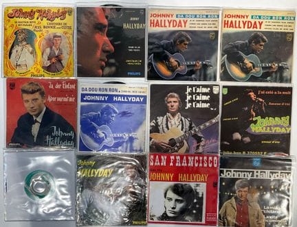 14 disques 45 tours de Johnny Hallyday contenant d