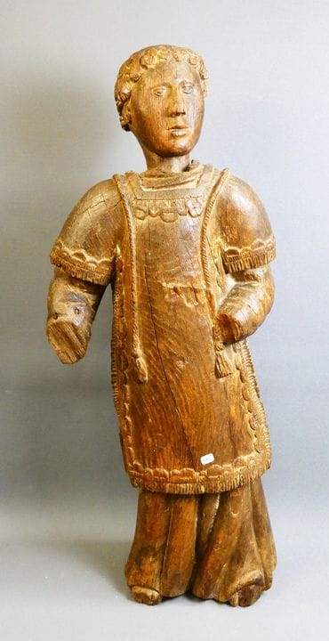 Santo diacono in quercia intagliata, avvolto in un