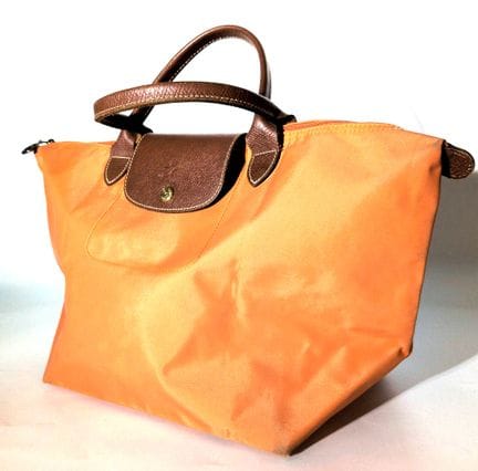 LONGCHAMP
Sac cabas en toile orange, anses en cuir