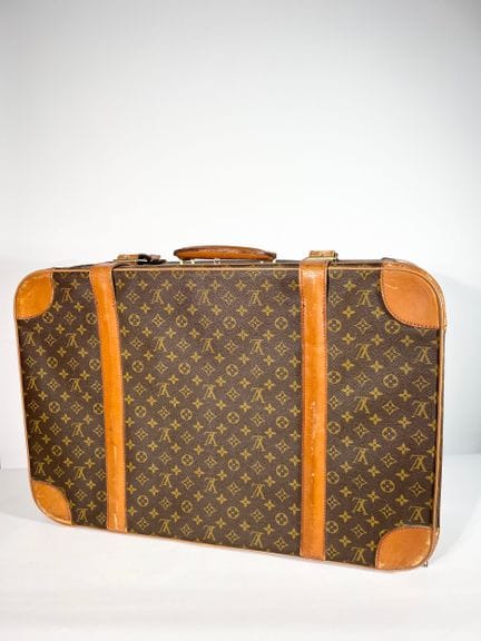 LOUIS VUITTON 
Grande valise à double sangle en to