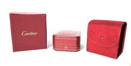 CARTIER 
Ensemble comprenant 3 boites rouges 
9,5 