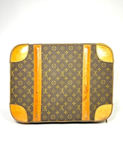 LOUIS VUITTON
Valise en toile enduite monogrammée 