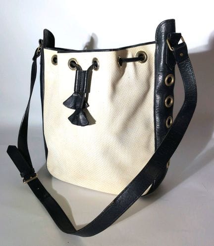 YVES SAINT LAURENT 
Sac sceau en toile ivoire et c