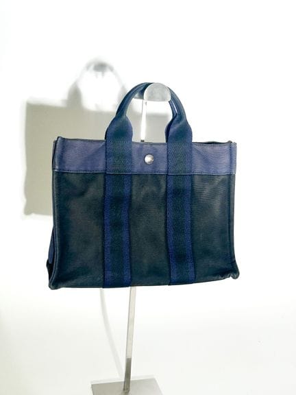 HERMÈS 
Sac cabas mini de couleur noire et bleue m