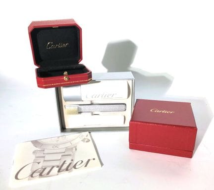 CARTIER 
Ensemble comprenant 2 boites et un kit de