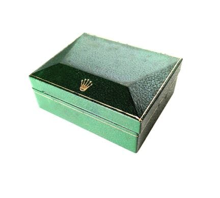 ROLEX, boîte verte foncée avec ligne dorée sur le 