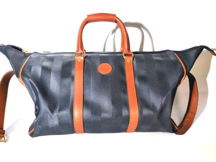 FENDI 
Sac de voyage en toile enduite rayée et cui