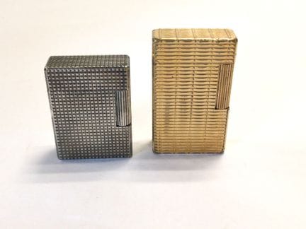 S.T DUPONT
Réunion de 2 briquets l'un en métal arg
