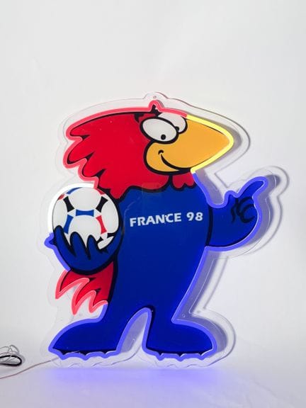 Letrero luminoso de Footix, la mascota del Mundial