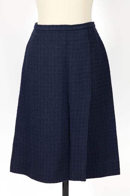 CHANEL, diseño. 
Falda lápiz hasta la rodilla de t