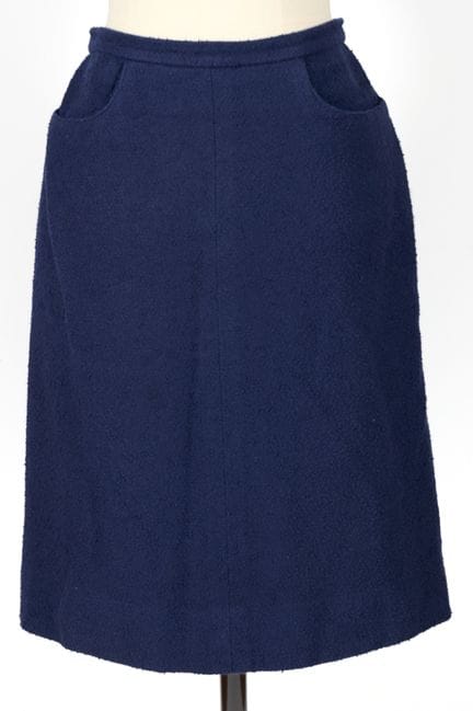 CHANEL, diseño. 
Falda lápiz hasta la rodilla de t