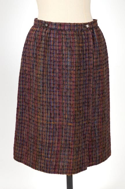 CHANEL, diseño.
Falda hasta la rodilla de tweed de