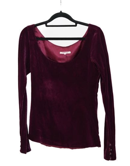 YVES SAINT LAURENT, riva sinistra.
Top a maniche l