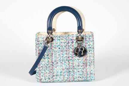 CHRISTIAN DIOR. 
Christian Dior
Lady Dior 粗花呢手袋，采用