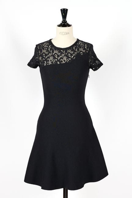 CHRISTIAN DIOR. 
Abito corto in lana nera, con la 