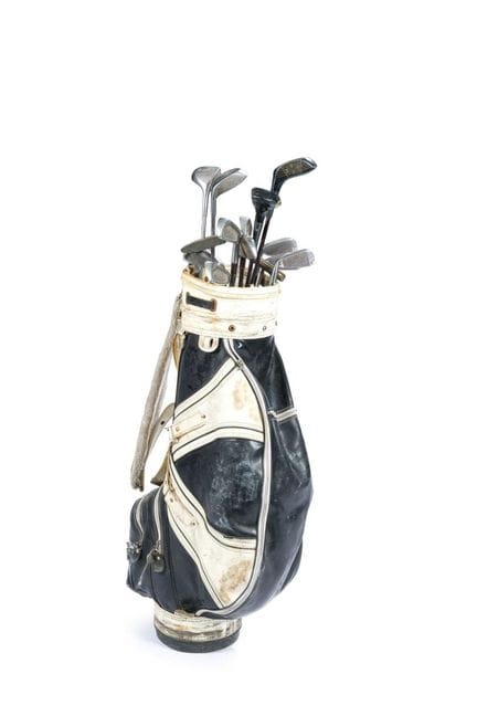 A set of golf clubs consisting of: four woods (one