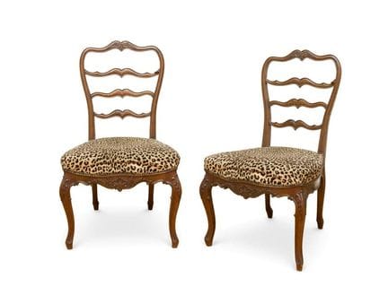 Pair of wooden chairs with "animal print" upholste