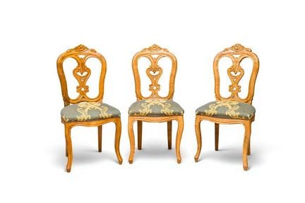 Set of 24 Louis XV-inspired dining chairs. 
Carved