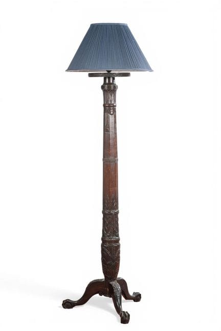 Carved wooden floor lamp decorated with drapery an