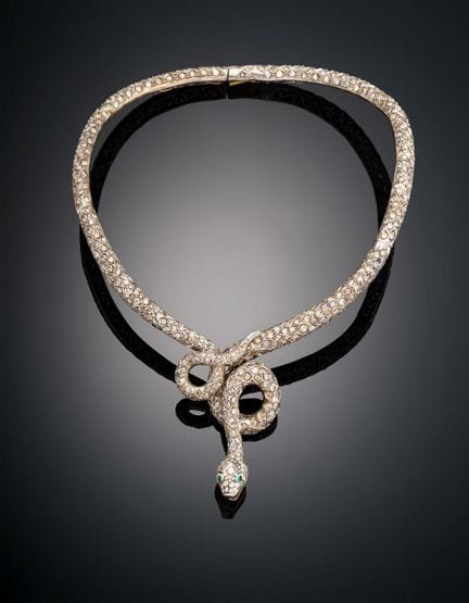 SNAKE CHOKER WITH DIAMONDS AND GARNETS
Stunning ch
