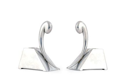 MAISON ARDI
Pair of chrome-plated candlesticks.
He
