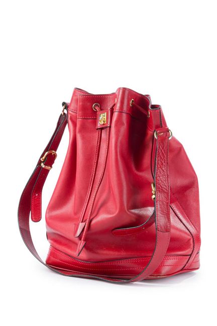 CELINE 
Vintage CELINE bucket bag in red leather. 
