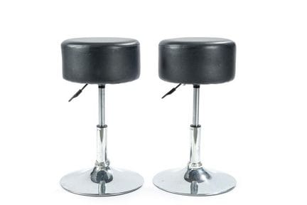 Pair of black leather stools with chrome-plated st
