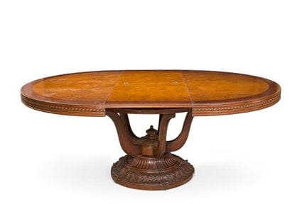 Mesa de comedor circular en madera de posible palo