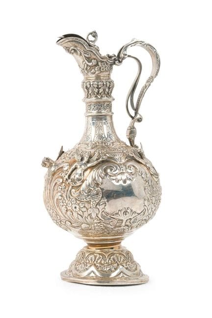 Spanish silver jug, hallmarked, with floral and ot