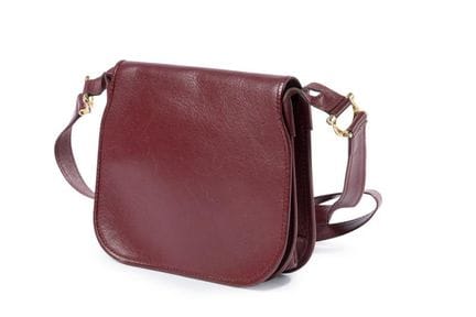 CARTIER
Maroon leather crossbody bag. Part of the 