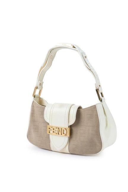 FENDI 
Vintage baguette bag in beige monogram canv