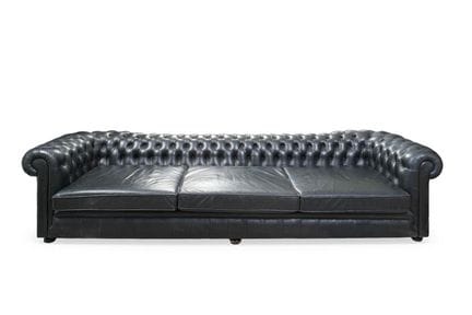Four-seater Chesterfield sofa in black leather wit