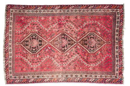 Caucasian wool rug with a central diamond-shaped d